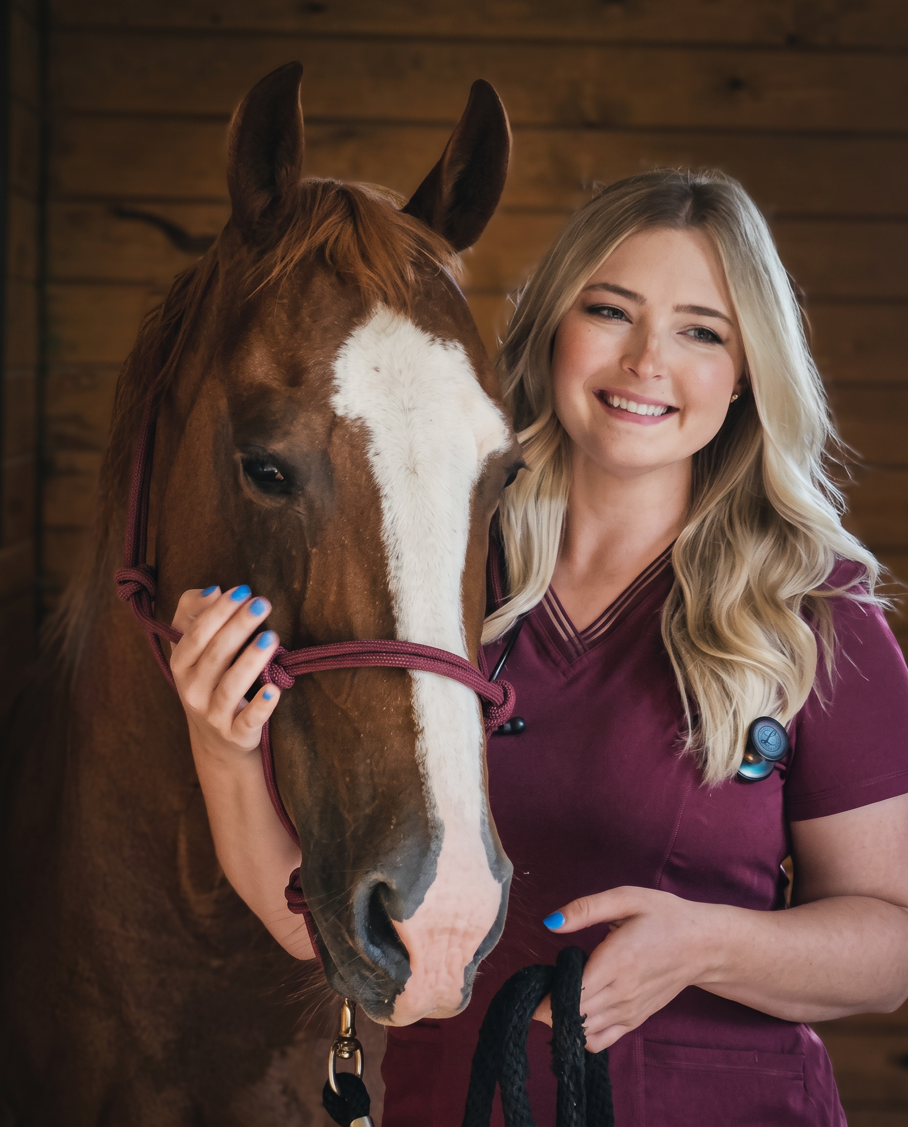 Dr. Kianna Spencer, board-certified equine theriogenologist, standing with a horse